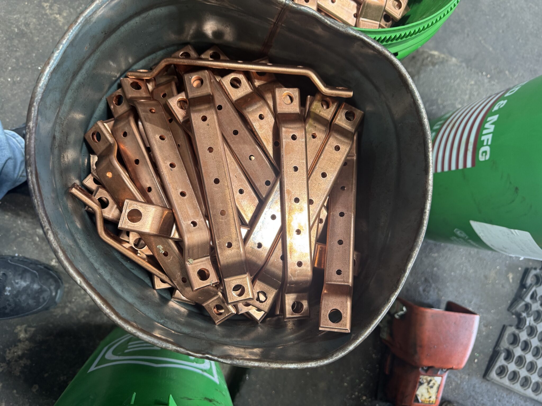 Fine blanking metal stamping process for tight-tolerance parts